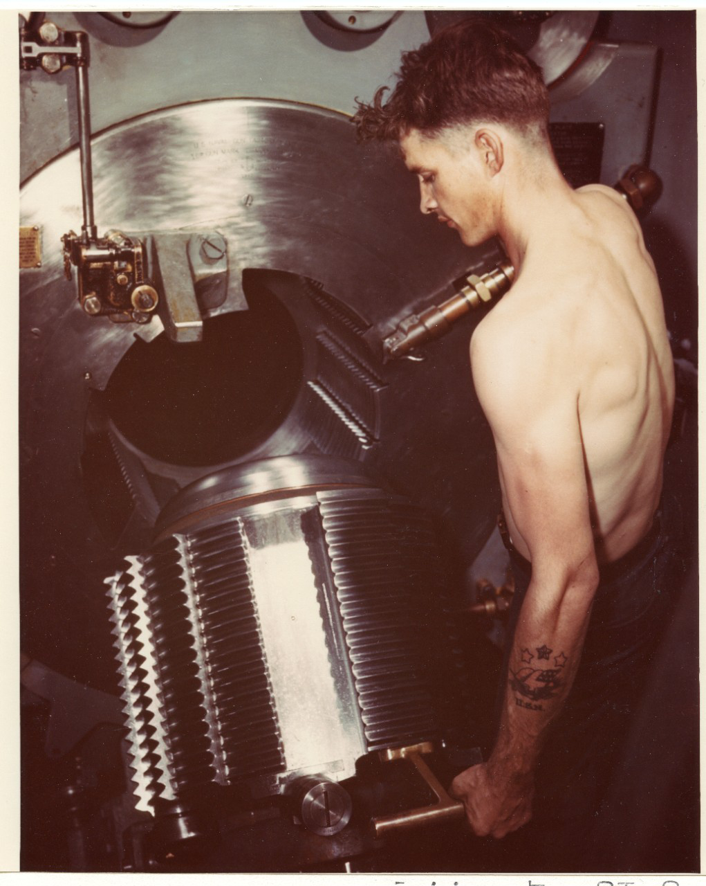 E.M. Smith, Gun Captain of one of the ship's nine 16"/50 Mk.VII main battery guns